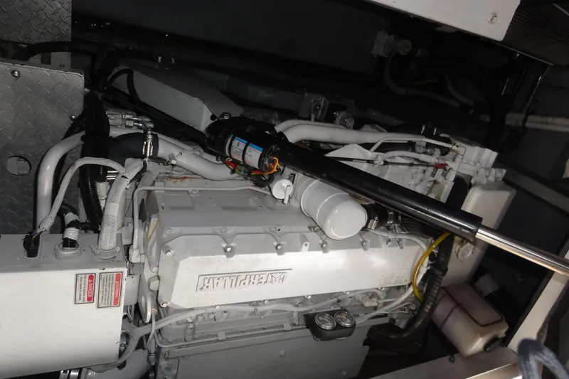 Slide: The Image of Engine compartment of a 2002 Sea Ray 380 Sundancer boat. - 56