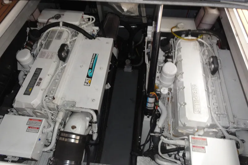 Slide: The Image of Engine room of a 2002 Sea Ray 380 Sundancer with twin Caterpillar engines. - 57