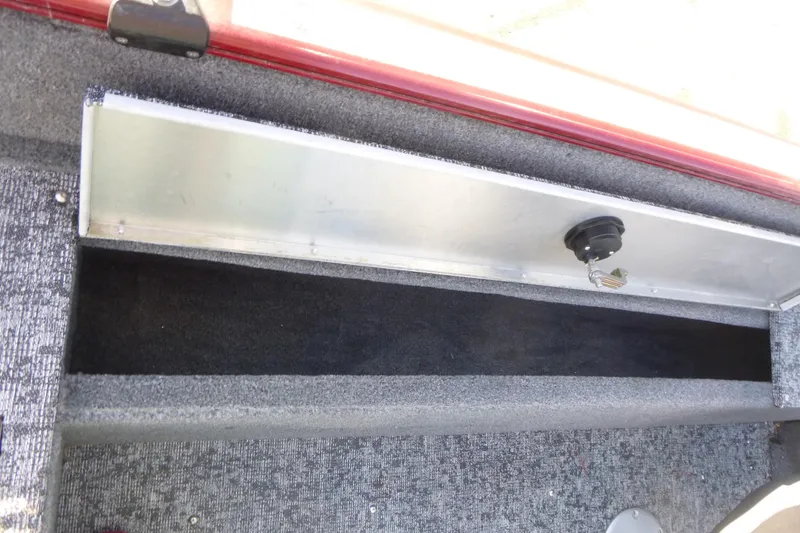 Slide: The Image of 2019 Tracker Pro Guide V-175 WT boat storage compartment with key lock. - 12