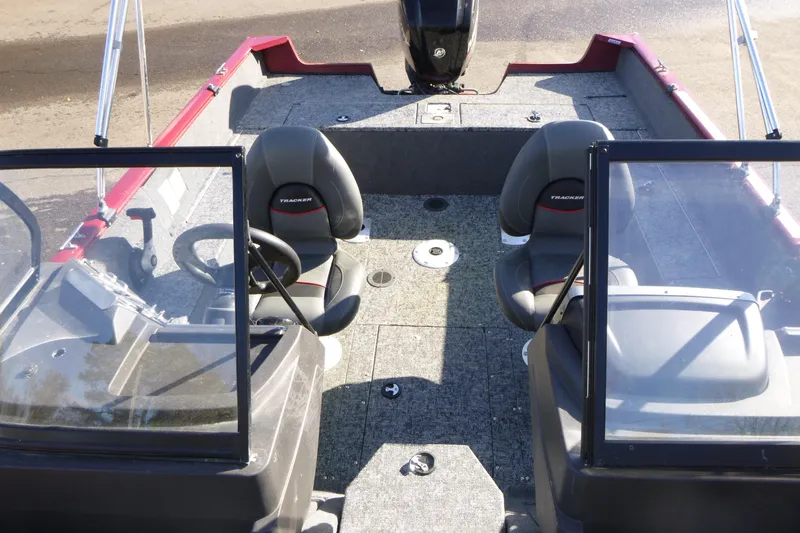 Slide: The Image of 2019 Tracker Pro Guide V-175 WT boat interior with seat and trolling motor. - 6