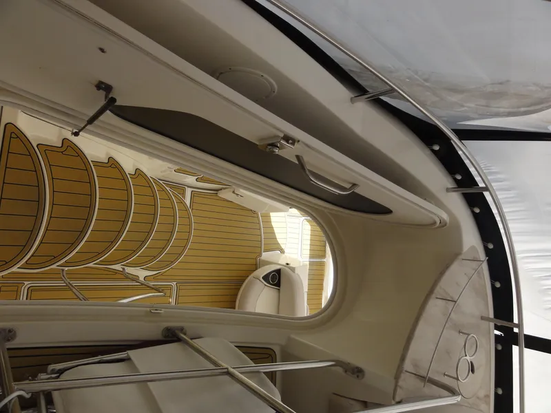 Slide: The Image of Interior view of a 2009 Meridian 441 Sedan yacht, showcasing elegant wooden flooring. - 27