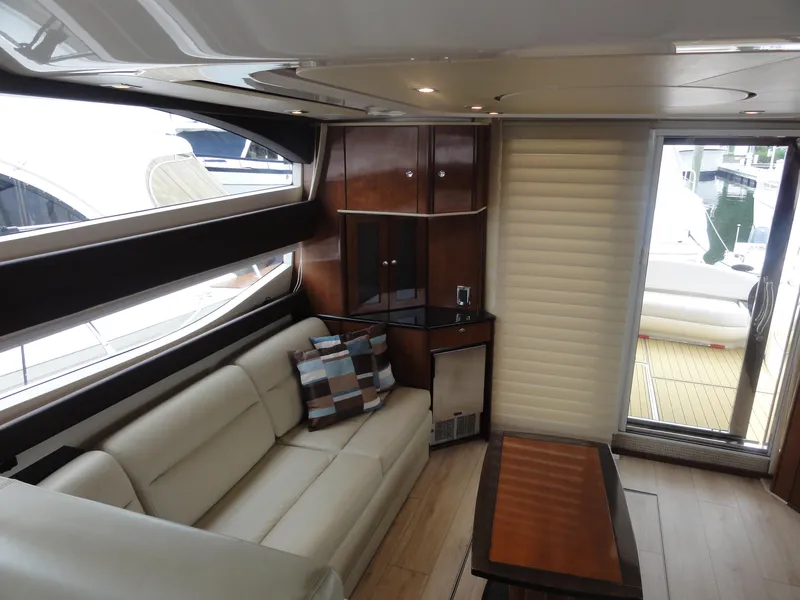 Slide: The Image of Luxurious interior of 2009 Meridian 441 Sedan yacht with leather seating and modern decor. - 35