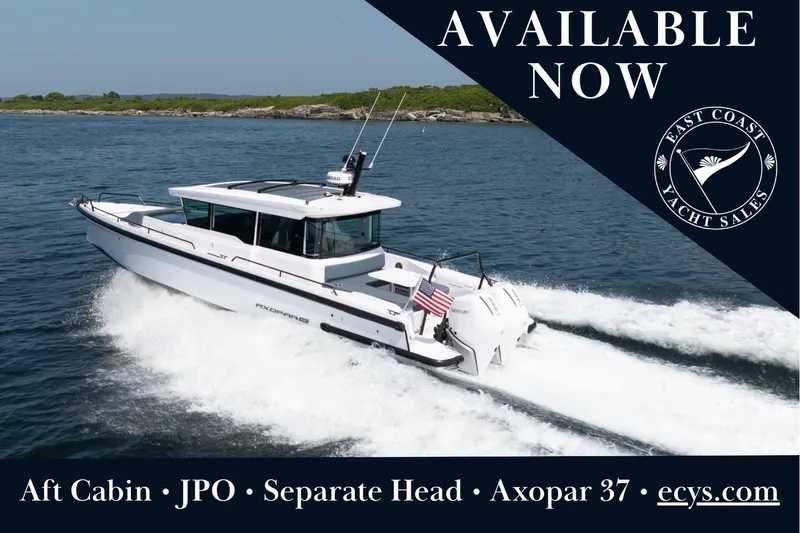 The Image of 2026 Axopar 37 XC Cross Cabin yacht cruising on open water, available at East Coast Yacht Sales. - 0