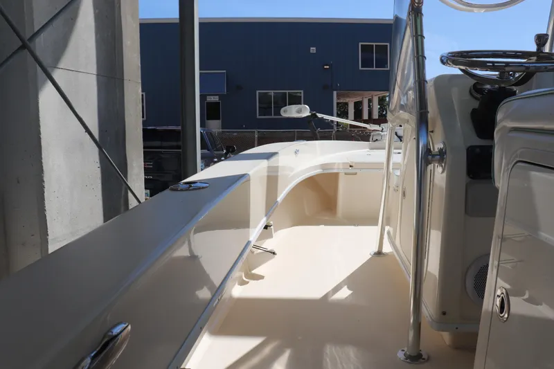 Slide: The Image of 2013 Young Boats 24 interior view, showcasing sleek design and spacious layout. - 13
