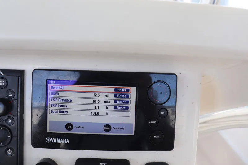 Slide: The Image of Yamaha display on 2013 Young Boats 24 showing trip data, hours  and fuel usage. - 21