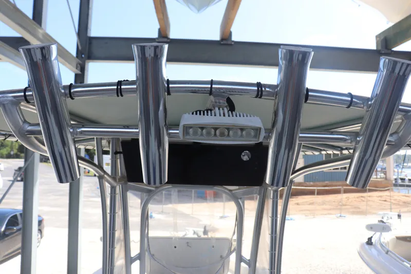 Slide: The Image of 2013 Young Boats 24 with stainless steel rod holders and LED light on T-top. - 30