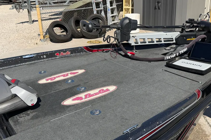 Slide: The Image of 2017 Bass Cat Eyra boat deck with Garmin and Minn Kota accessories. - 14