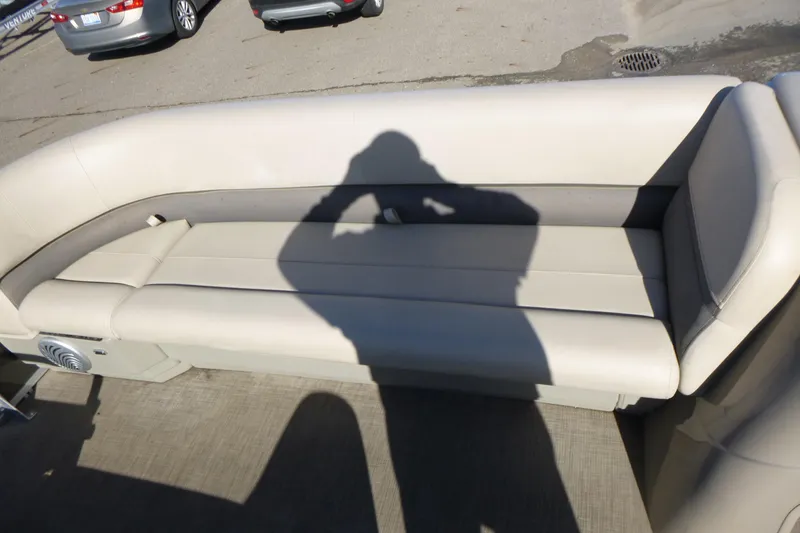 Slide: The Image of 2022 Sun Tracker Party Barge 18 DLX, beige seating, outdoor setting. - 7