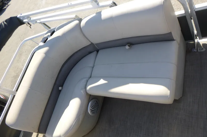 Slide: The Image of 2022 Sun Tracker Party Barge 18 DLX pontoon boat seating with cup holders and speaker. - 9