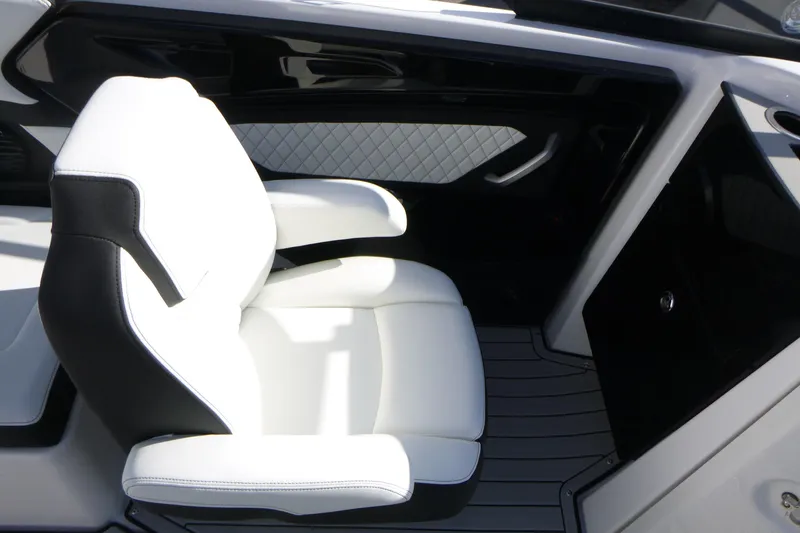 Slide: The Image of 2026 Yamaha Boats 252SD interior with luxurious white and black seating. - 12