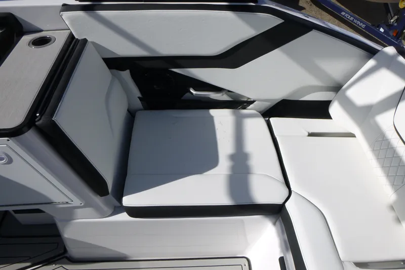 Slide: The Image of 2026 Yamaha Boats 252SD interior seating with modern design and comfortable upholstery. - 16