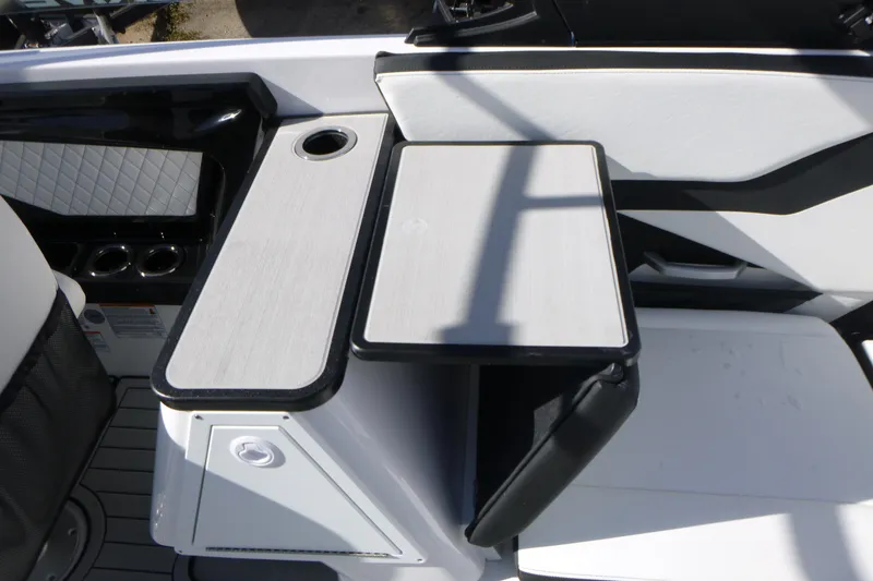 Slide: The Image of 2026 Yamaha Boats 252SD interior with sleek seating and cup holders. - 17