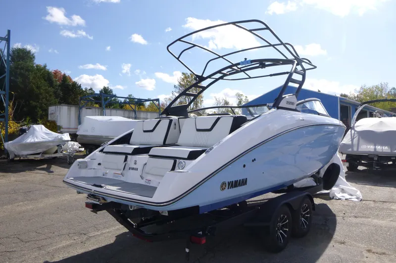 Slide: The Image of 2026 Yamaha Boats 252SD on trailer, sleek design, outdoor setting, clear sky. - 3