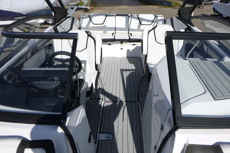Slide: The Image of 2026 Yamaha Boats 252SD interior with sleek design and modern seating arrangement. - 6