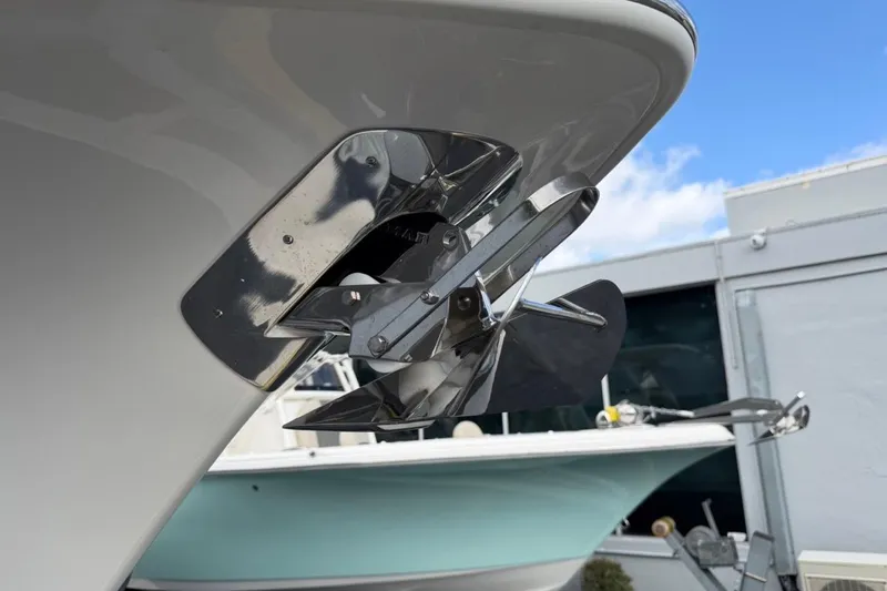 Slide: The Image of Close-up of 2026 Key West 291 FS boat anchor against a blue sky. - 14