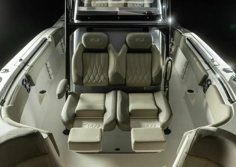 Slide: The Image of 2026 Key West 291 FS boat on trailer, sleek design, parked outdoors. - 4