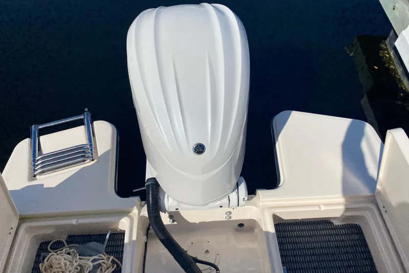 Slide: The Image of 2024 Grady-White Fisherman 236 boat engine and deck view. - 16