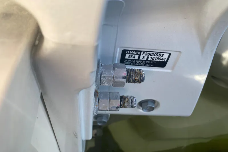 Slide: The Image of Close-up of Yamaha F300XSB2 engine part on 2024 Grady-White Fisherman 236 boat. - 18