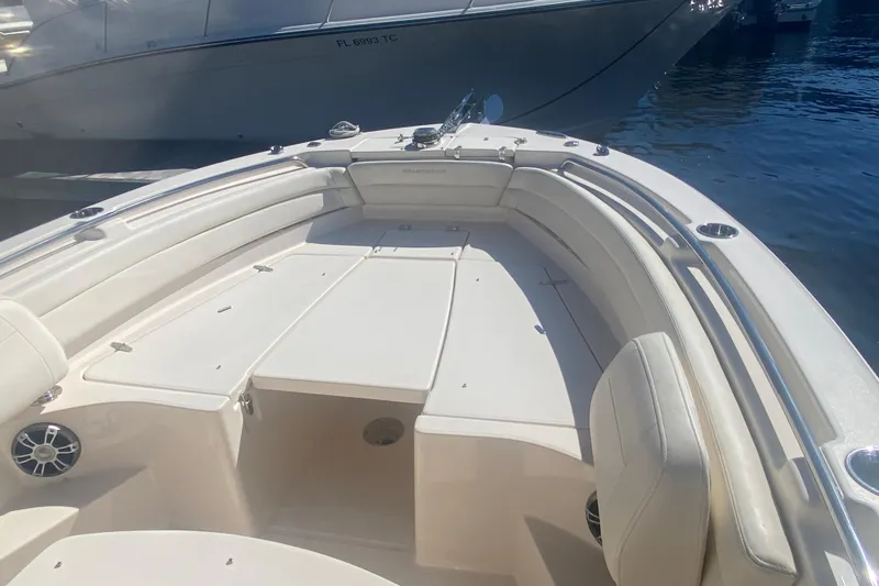 Slide: The Image of 2024 Grady-White Fisherman 236 boat interior with spacious seating and storage. - 2