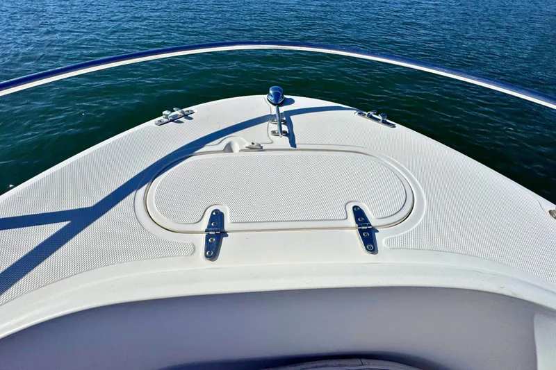 Slide: The Image of Bow of 2002 Sea Hunt Escape 200 boat on calm water. - 14