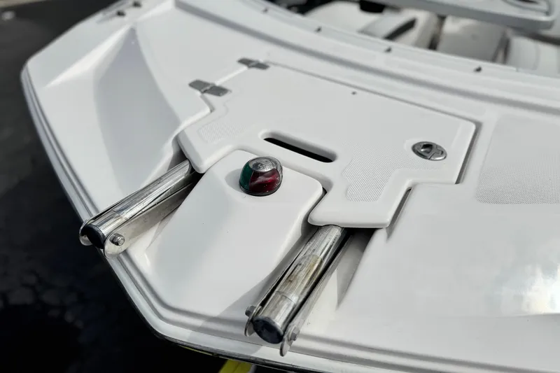 Slide: The Image of 2014 Regal 27 FasDeck boat stern with stainless steel ladder and navigation light. - 14