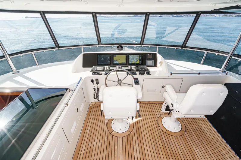 Slide: The Image of Cockpit of 2010 Ocean Alexander Motor Yacht with navigation equipment and ocean view. - 21