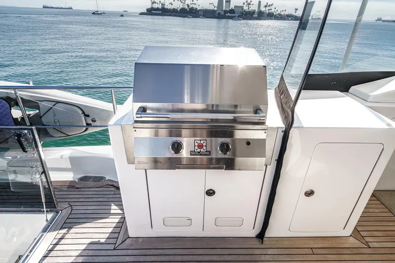 Slide: The Image of Outdoor grill on 2010 Ocean Alexander motor yacht deck with ocean view. - 27