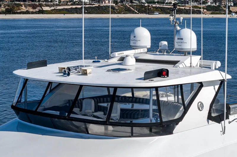 Slide: The Image of 2010 Ocean Alexander Motor Yacht with advanced navigation equipment on calm waters. - 28