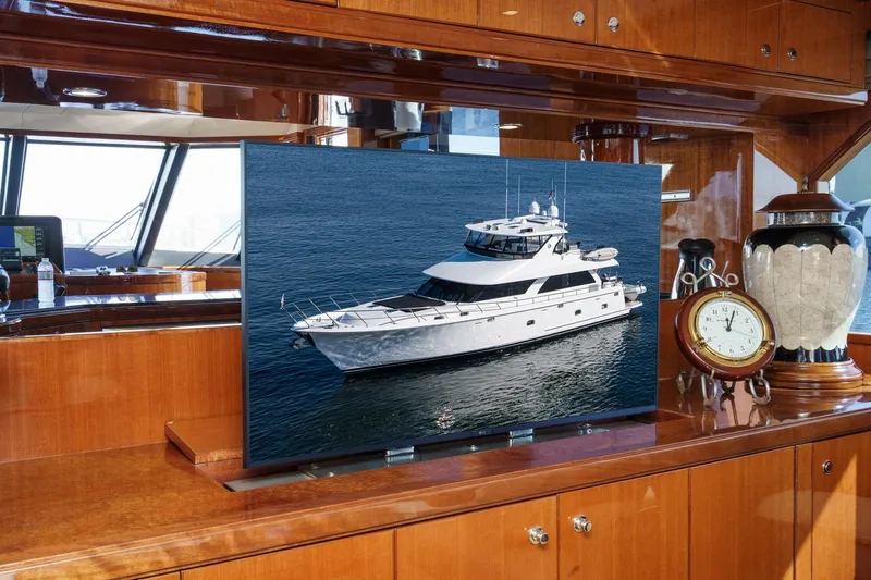 Slide: The Image of Luxurious 2010 Ocean Alexander motor yacht displayed on elegant wooden interior. - 36