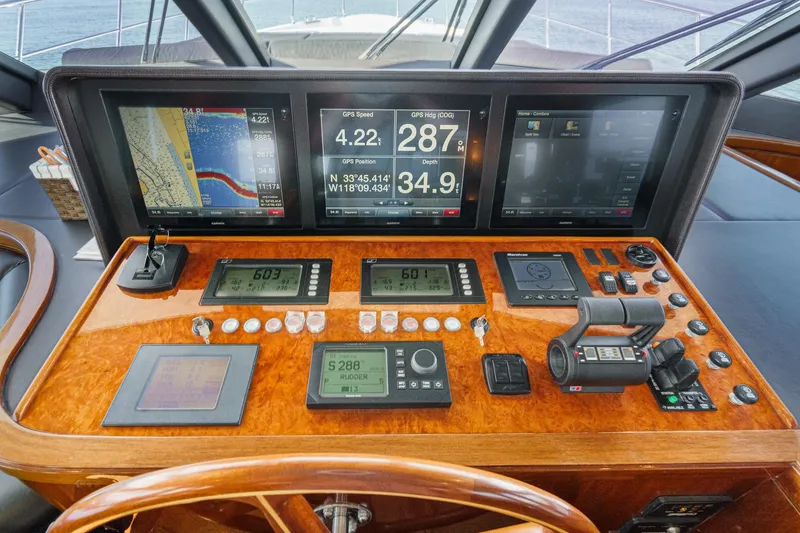 Slide: The Image of Control panel of a 2010 Ocean Alexander Motor Yacht with navigation displays and instruments. - 47