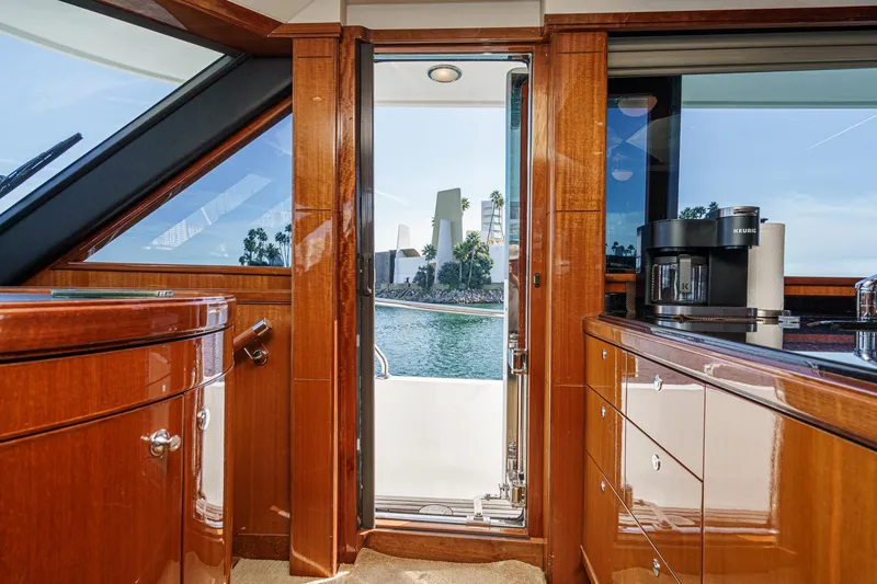 Slide: The Image of Luxurious interior of 2010 Ocean Alexander motor yacht with wood finish and ocean view. - 49