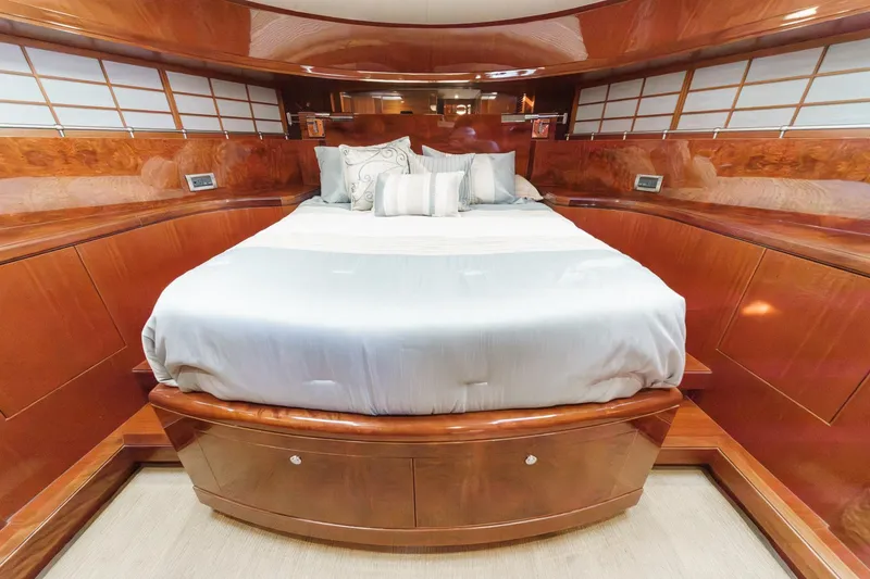 Slide: The Image of Luxurious Ocean Alexander 2010 motor yacht bedroom with elegant wood finish and plush bedding. - 53