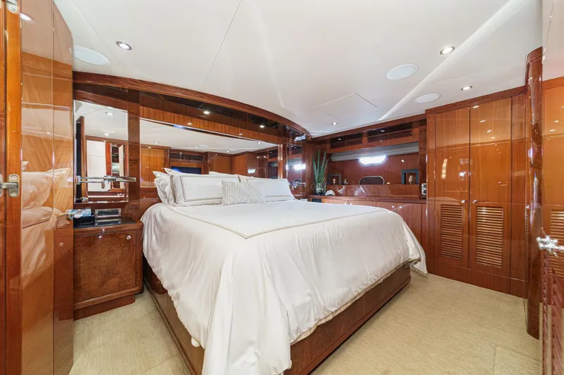 Slide: The Image of Luxurious bedroom interior of 2010 Ocean Alexander Motor Yacht with elegant wood finishes. - 60