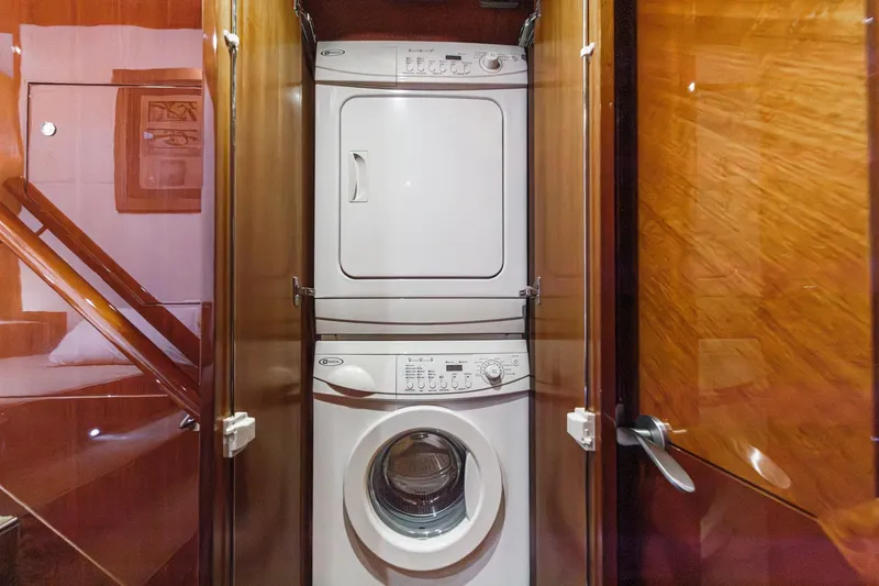 Slide: The Image of Stacked washer and dryer in 2010 Ocean Alexander motor yacht interior. - 63