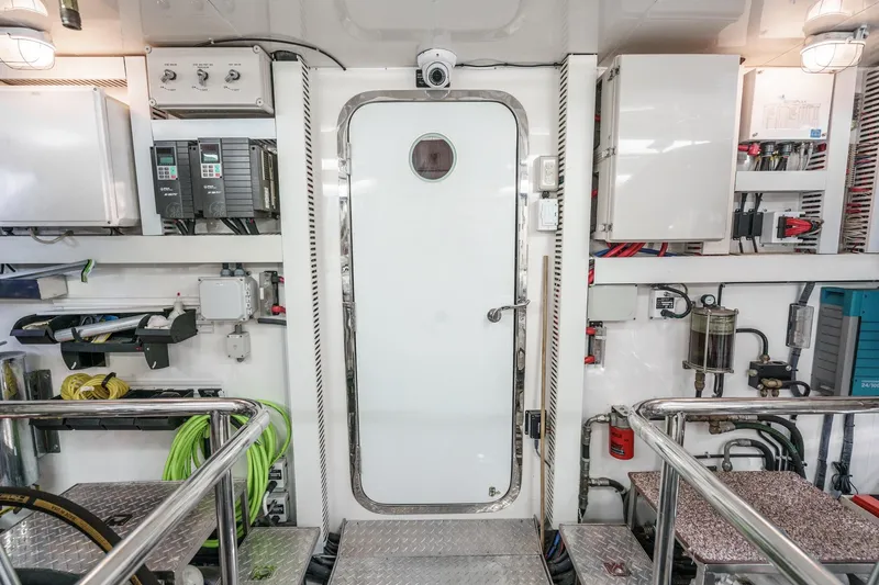 Slide: The Image of Engine room of 2010 Ocean Alexander Motor Yacht with equipment and control panels. - 68