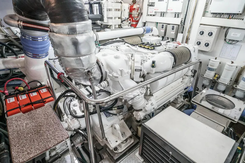 Slide: The Image of Engine room of a 2010 Ocean Alexander Motor Yacht, showcasing machinery and equipment. - 71