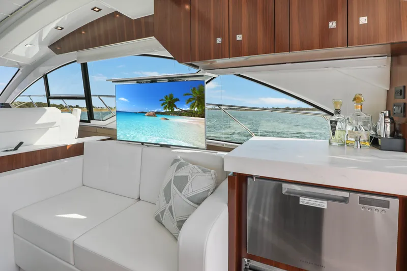 Slide: The Image of Luxurious interior of 2022 Cruisers Yachts 54 Cantius with modern amenities and scenic view. - 41