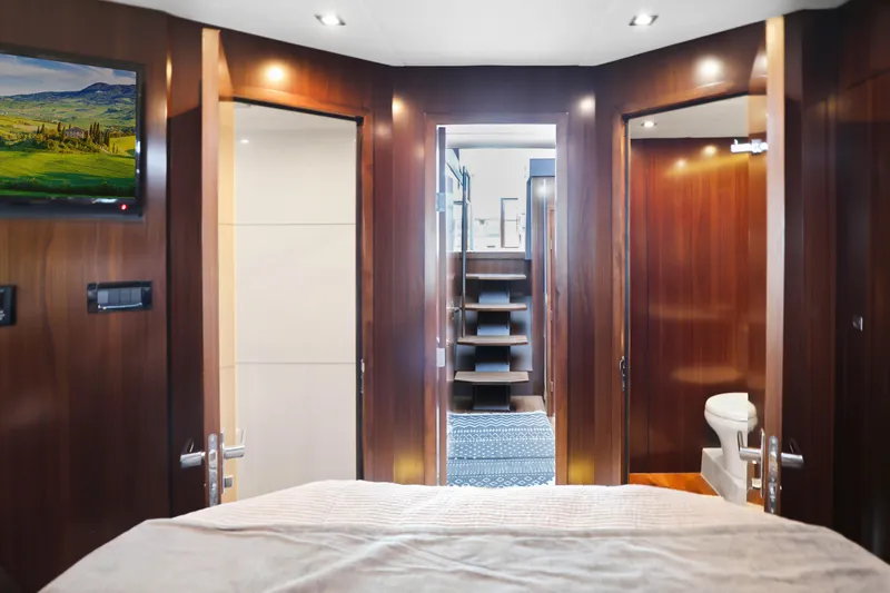 Slide: The Image of Luxurious interior of 2022 Cruisers Yachts 54 Cantius with wood finishes and modern amenities. - 62