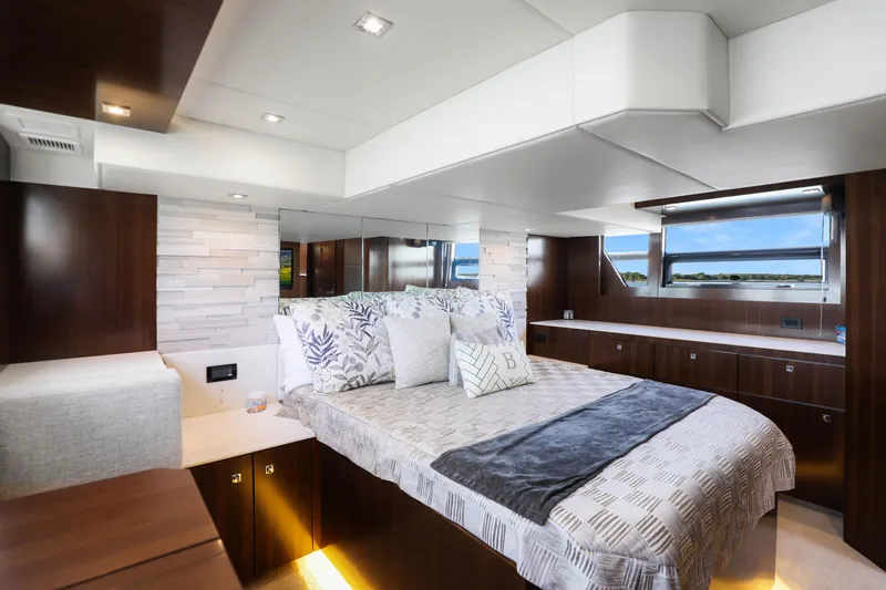 Slide: The Image of Luxurious bedroom interior of 2022 Cruisers Yachts 54 Cantius with modern design and scenic view. - 66