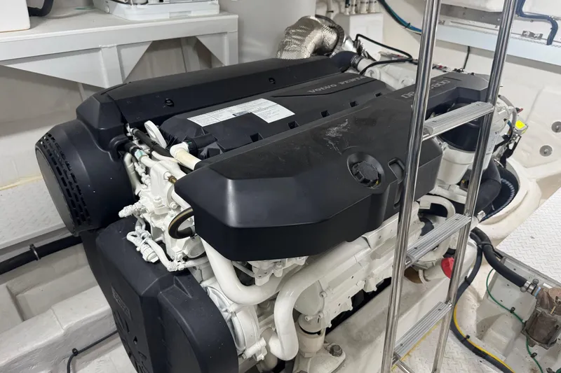 Slide: The Image of Engine room of 2022 Cruisers Yachts 54 Cantius with Volvo Penta engine. - 77