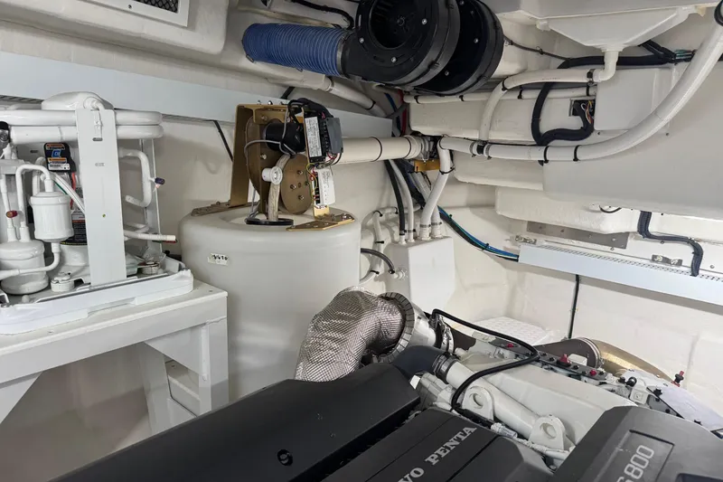 Slide: The Image of Engine room of 2022 Cruisers Yachts 54 Cantius with Volvo Penta components. - 80