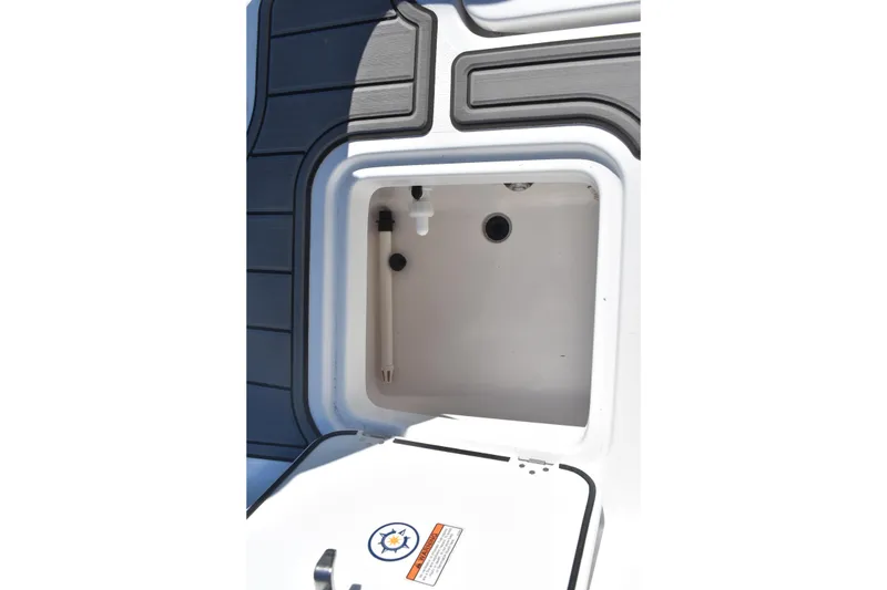 Slide: The Image of 2025 NauticStar 251 Hybrid boat storage compartment with sleek design and modern features. - 19