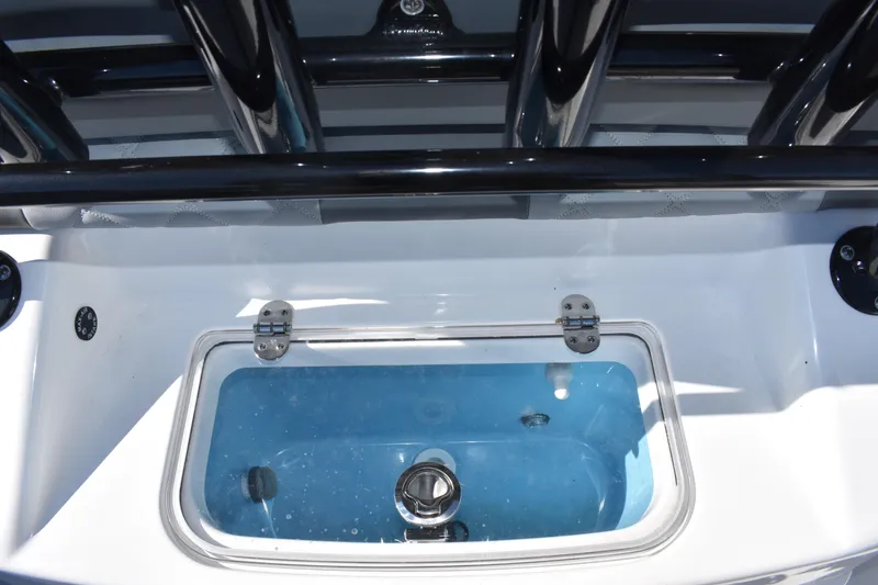 Slide: The Image of Livewell on 2025 NauticStar 251 Hybrid boat, featuring sleek design and functionality. - 25