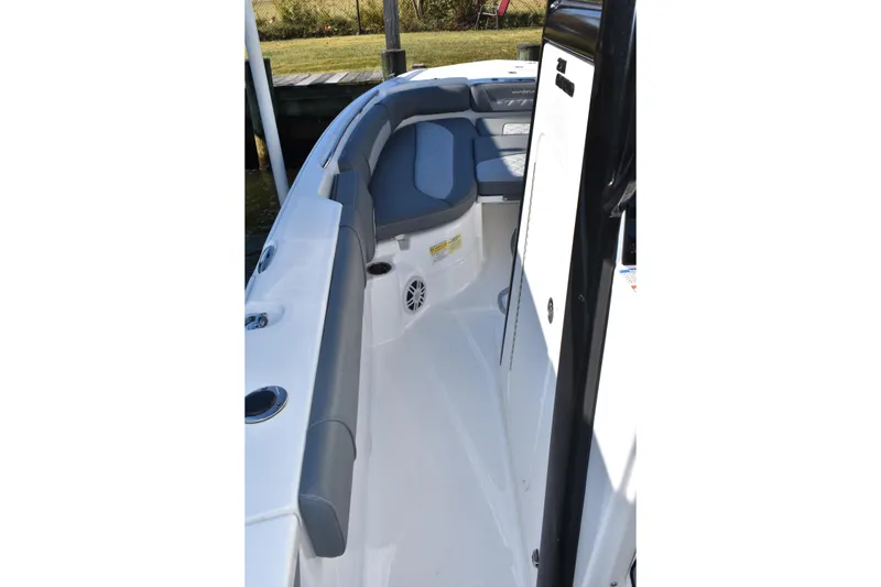 Slide: The Image of 2025 NauticStar 251 Hybrid boat interior with cushioned seating and sleek design. - 37
