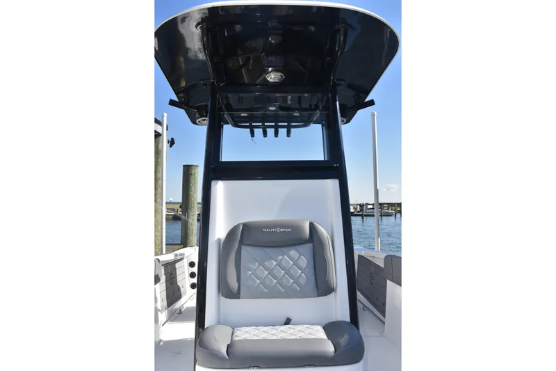 Slide: The Image of 2025 NauticStar 251 Hybrid boat interior with cushioned seating and sleek design. - 42