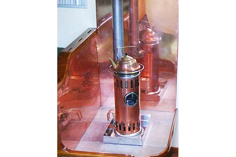 Slide: The Image of Copper stove inside 1985 Sam L. Morse Bristol Channel Cutter 28 yacht. - 5