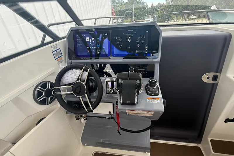 Slide: The Image of Navan S30 2026 boat cockpit with advanced navigation controls and digital display. - 12