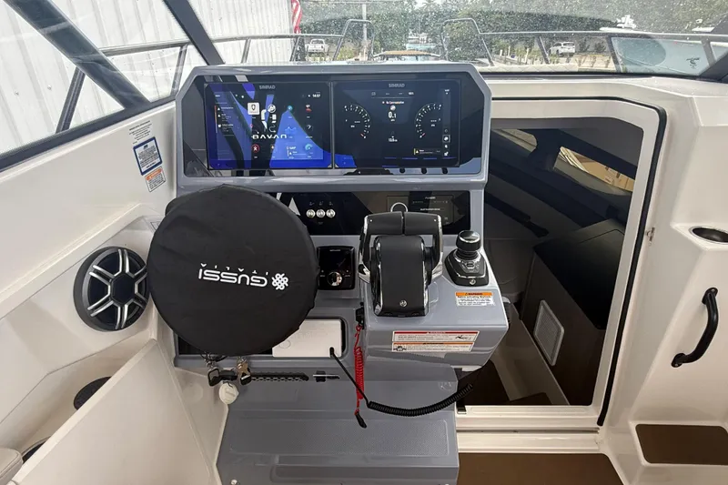 Slide: The Image of Control panel of 2026 Navan S30 boat with advanced navigation displays. - 13