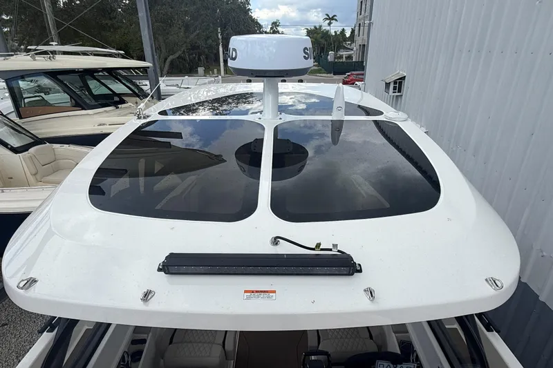 Slide: The Image of 2026 Navan S30 boat with sleek roof design and radar equipment. - 21