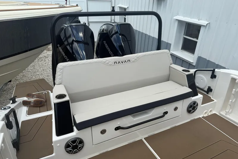 Slide: The Image of 2026 Navan S30 boat with dual Mercury engines and cushioned seating. - 6